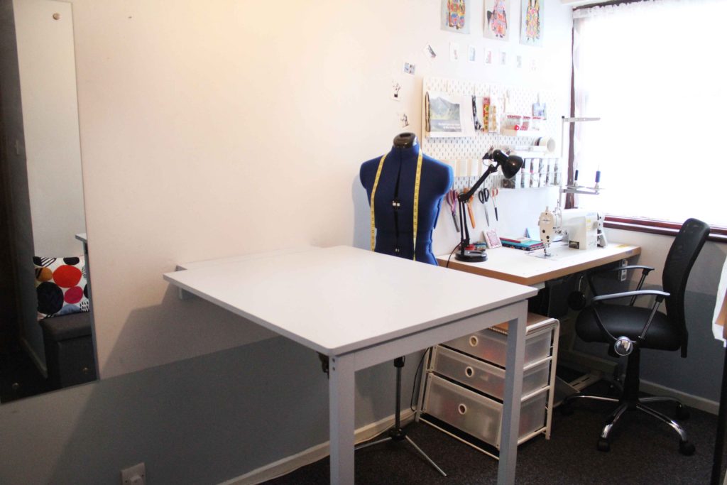 Tammy Silver sewing room with cutting table