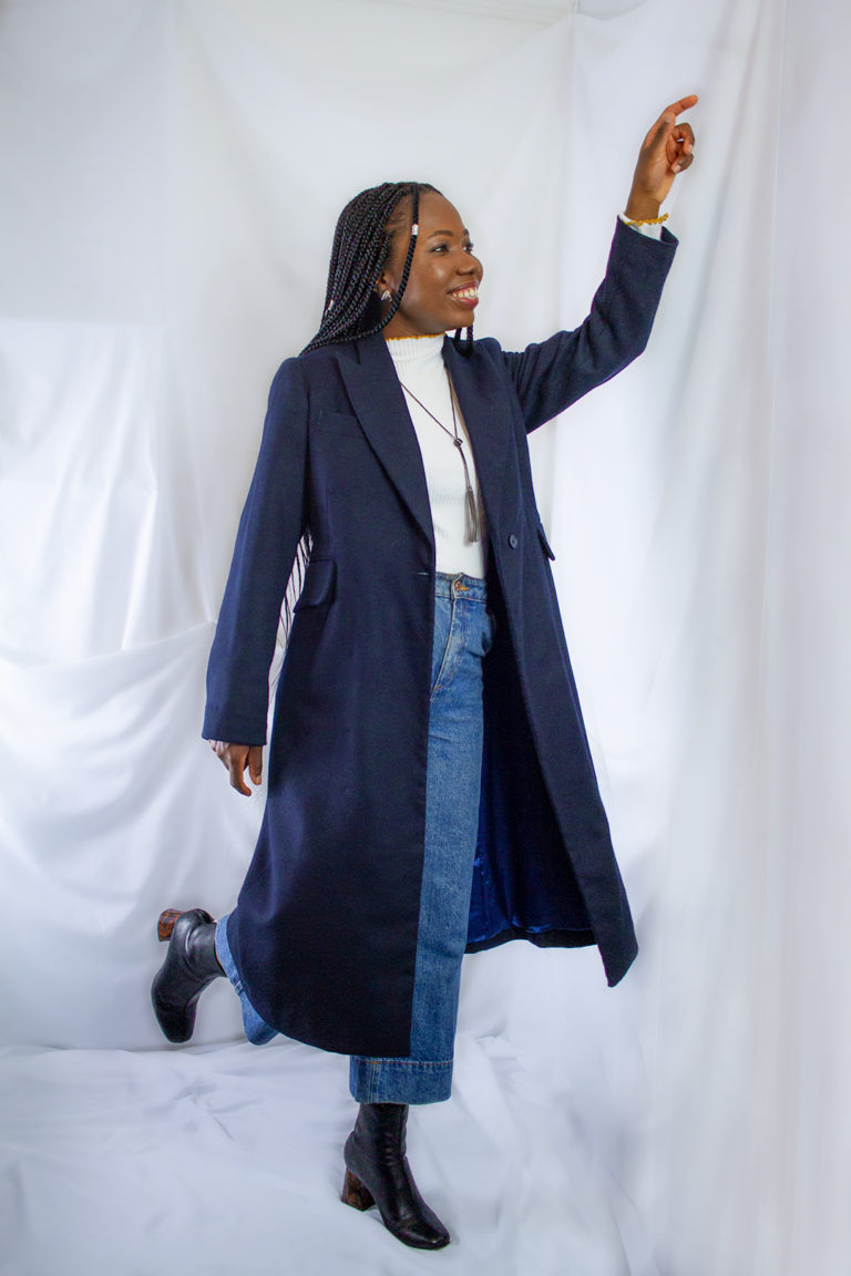 Tammy Silver wearing a tailor made navy wool coat