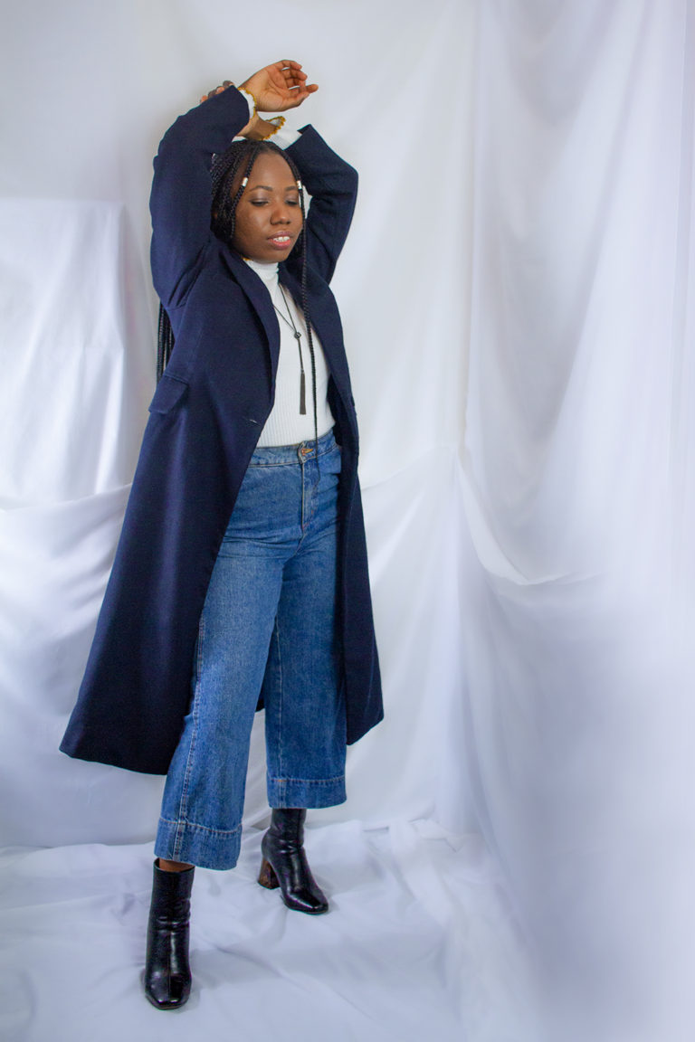 Tammy Silver wearing a tailor made navy wool coat